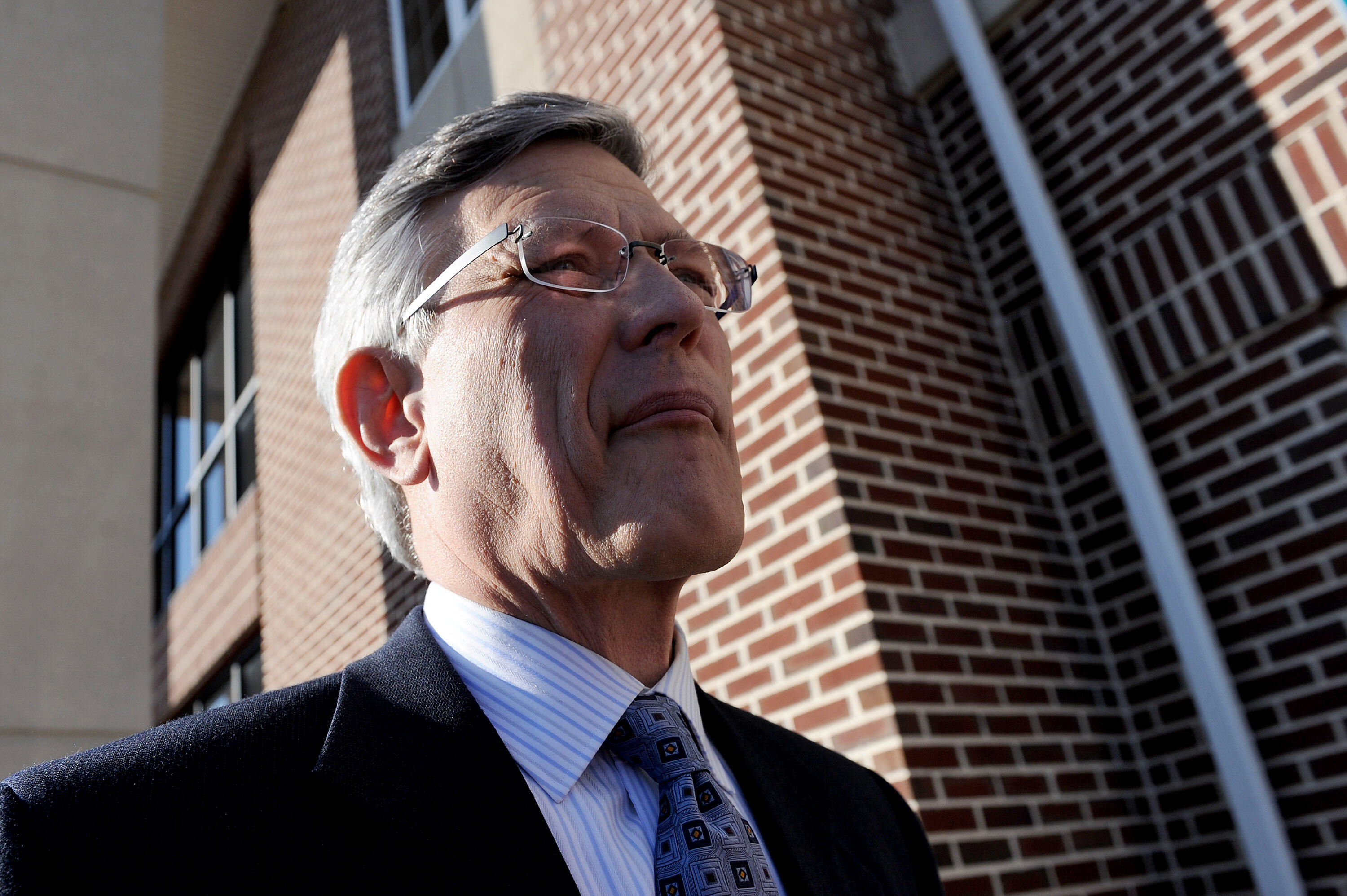 HARRISBURG, PA - NOVEMBER 7:  Penn State athletic director Tim Curley walks out of the Magisterial District Court  after being arraigned on charges of perjury and failure to report under Pennsylvania's child protective services law on November 7, 2011 in 