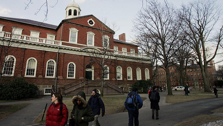 CAMBRIDGE, MA - FEBRUARY 21:  Harvard University students walk through the campus on the day Harvard University president, Lawrence H. Summers announced he is resigning at the end of the academic year February 21, 2006 in Cambridge, Massachusetts. Summers