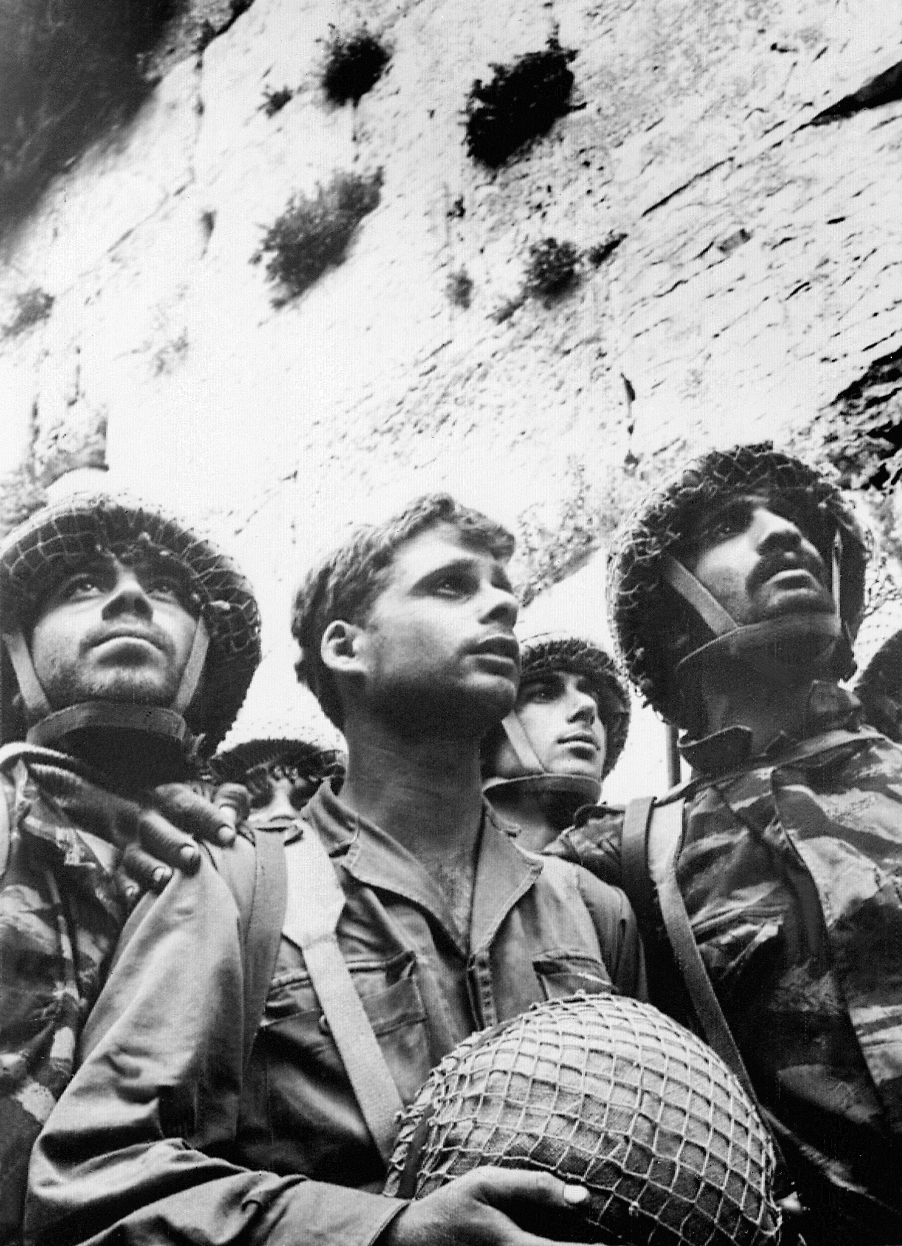 JERUSALEM:Israeli soldiers celebrate 09 June 1967 in Jerusalem the conquest by Israeli troops over Jordan, the Wailing Wall in the eastern part of the Holy City. 05 June 1967, Israel launched a massive air assault that crippled Arab air capability. Israel