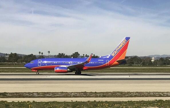 A Southwest airlines plane sits on the tarmac at Los Angeles airport Januray 30, 2017. / AFP / Daniel SLIM        (Photo credit should read DANIEL SLIM/AFP/Getty Images)