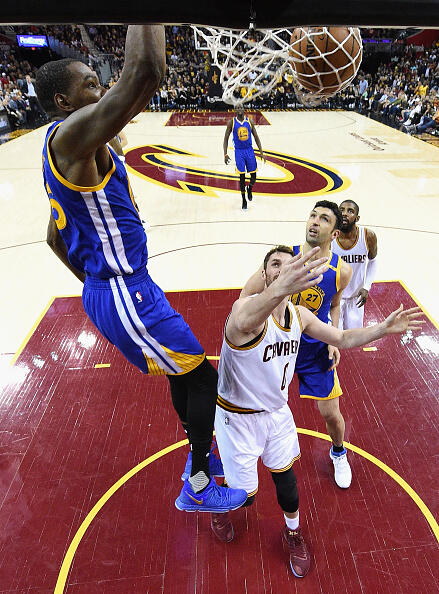 CLEVELAND, OH - JUNE 07: Kevin Durant #35 of the Golden State Warriors dunks in the second half against Kevin Love #0 of the Cleveland Cavaliers in Game 3 of the 2017 NBA Finals at Quicken Loans Arena on June 7, 2017 in Cleveland, Ohio. NOTE TO USER: User expressly acknowledges and agrees that, by downloading and or using this photograph, User is consenting to the terms and conditions of the Getty Images License Agreement.  (Photo by Kyle Terada - Pool/Getty Images)