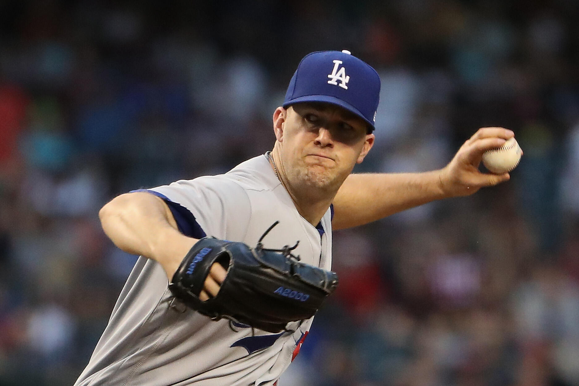 PHOENIX, AZ - APRIL 21:  Starting pitcher Alex Wood #57 of the Los Angeles Dodgers pitches against the Arizona Diamondbacks during the first inning of the MLB game at Chase Field on April 21, 2017 in Phoenix, Arizona.  (Photo by Christian Petersen/Getty I