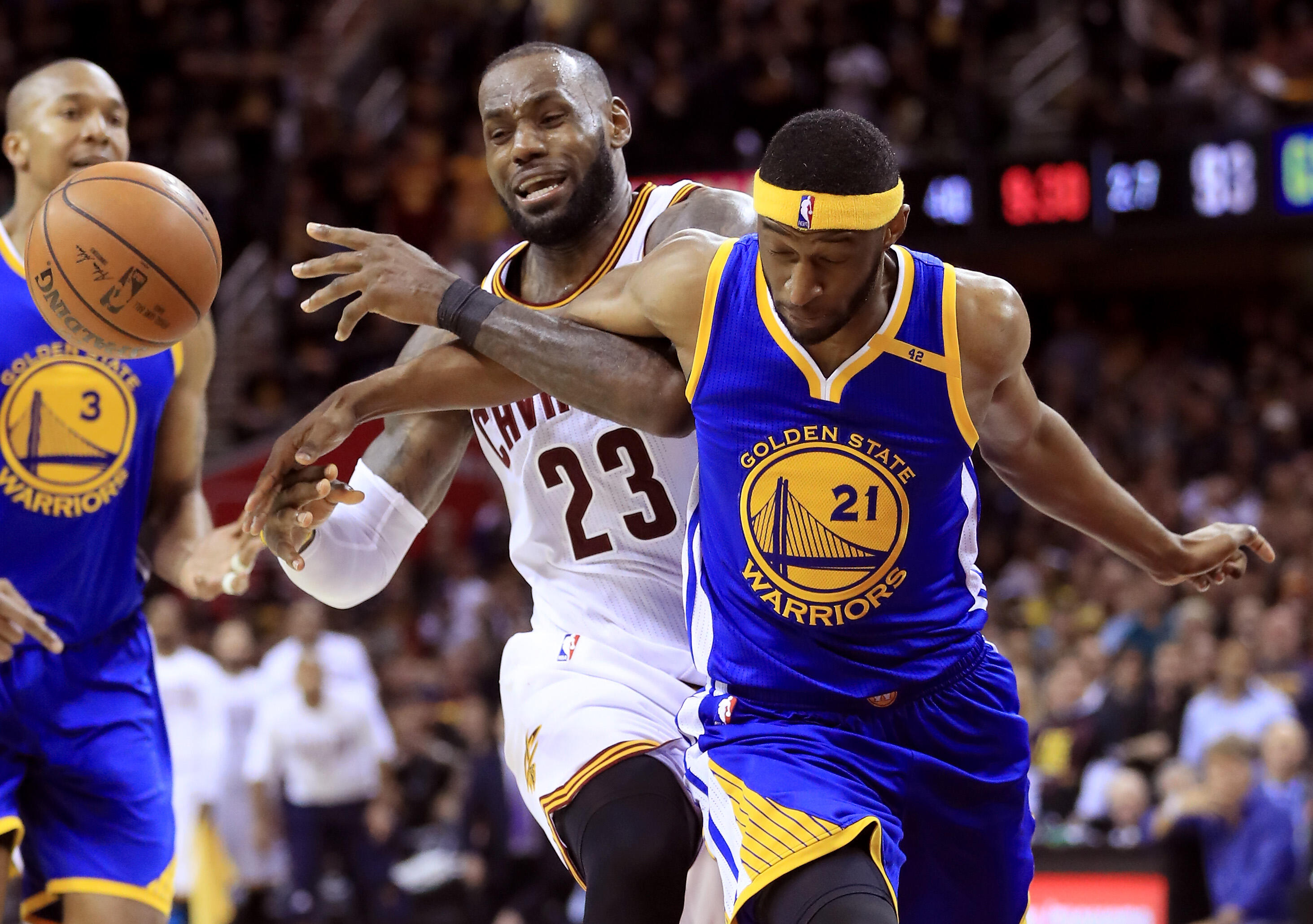CLEVELAND, OH - JUNE 07: LeBron James #23 of the Cleveland Cavaliers competes for the ball with Ian Clark #21 of the Golden State Warriors in the second half in Game 3 of the 2017 NBA Finals at Quicken Loans Arena on June 7, 2017 in Cleveland, Ohio. NOTE 
