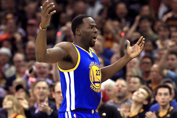 CLEVELAND, OH - JUNE 09:  Draymond Green #23 of the Golden State Warriors reacts after a foul call in the first quarter against the Cleveland Cavaliers in Game 4 of the 2017 NBA Finals at Quicken Loans Arena on June 9, 2017 in Cleveland, Ohio. NOTE TO USER: User expressly acknowledges and agrees that, by downloading and or using this photograph, User is consenting to the terms and conditions of the Getty Images License Agreement.  (Photo by Ronald Martinez/Getty Images)