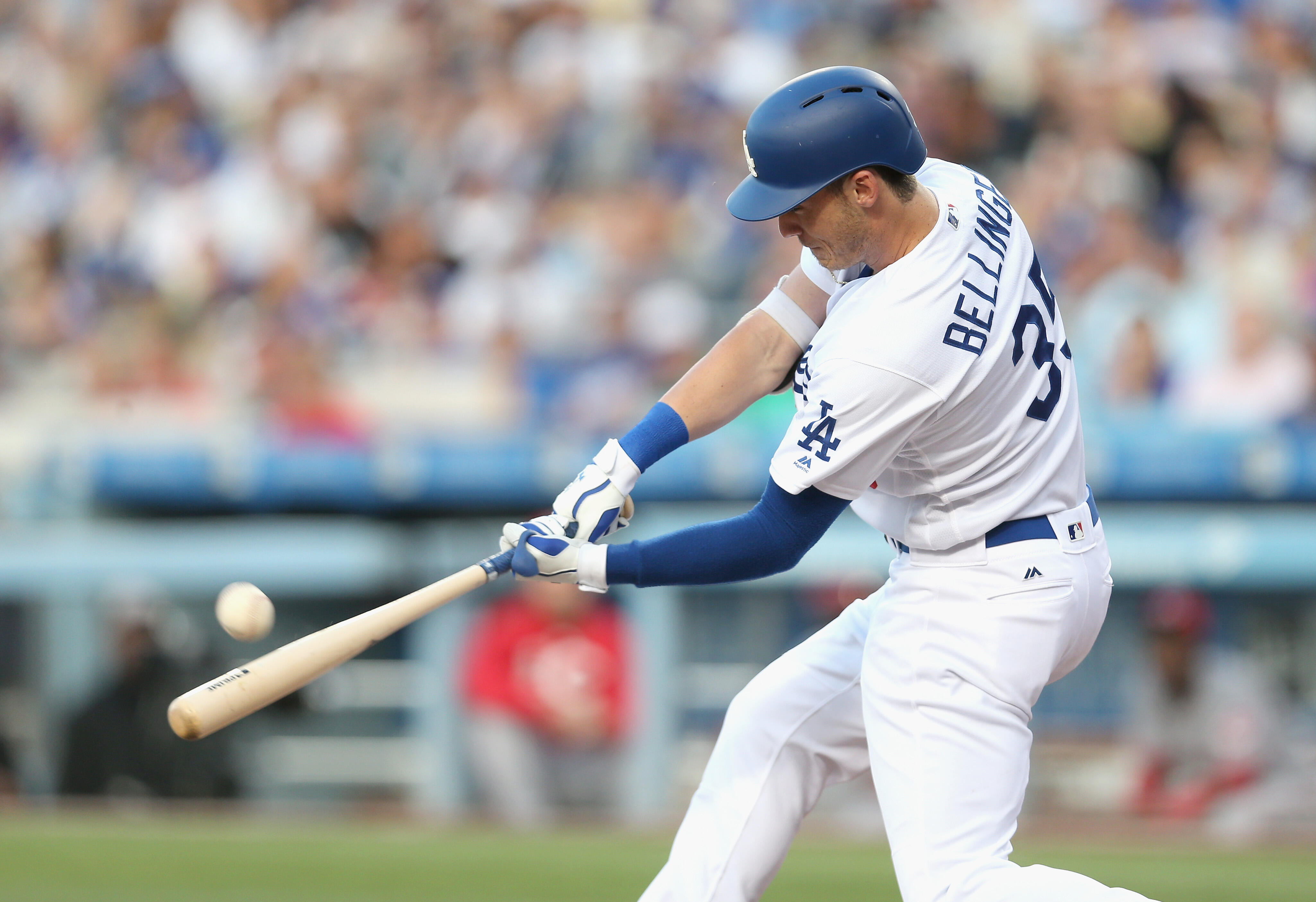 LOS ANGELES, CA - JUNE 10:  Cody Bellinger #35 of the Los Angeles Dodgers hits a solo home run in the first inning against the Cincinnati Reds at Dodger Stadium on June 10, 2017 in Los Angeles, California.  (Photo by Stephen Dunn/Getty Images)