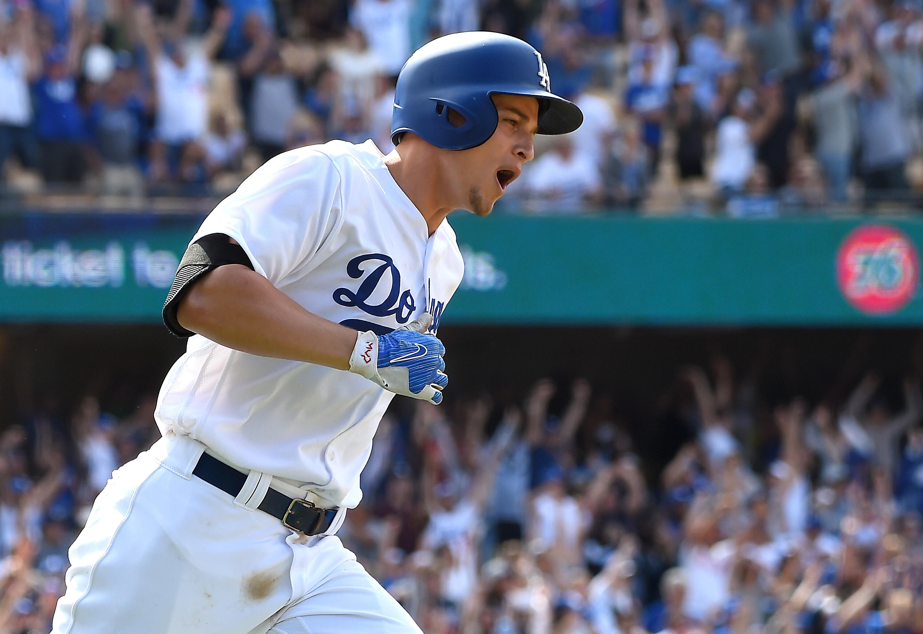 LOS ANGELES, CA - JUNE 11:  Corey Seager #5 of the Los Angeles Dodgers yells as he rounds the bases on a grand slam home run in the eighth inning inning of the game against the Cincinnati Reds at Dodger Stadium on June 11, 2017 in Los Angeles, California.