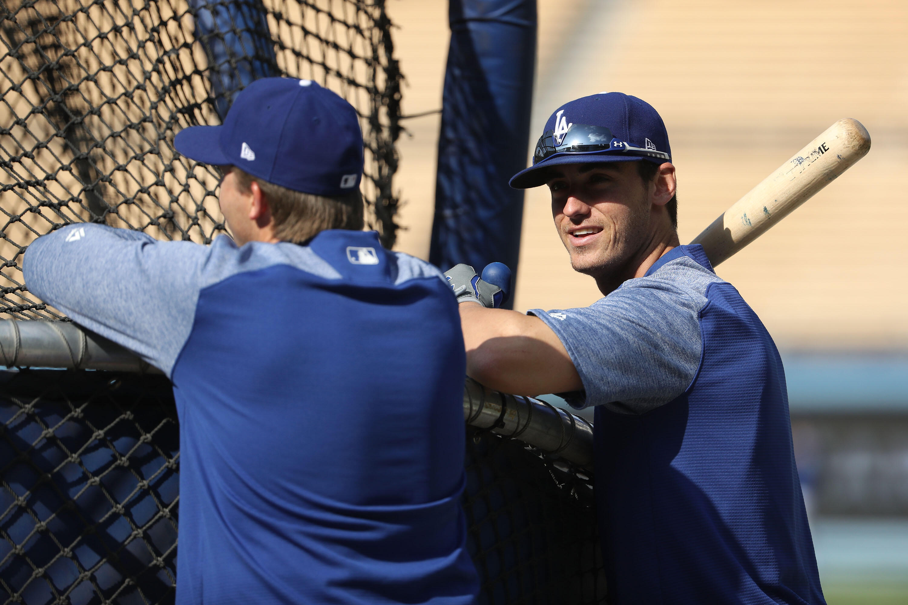 LOS ANGELES, CA - MAY 09: Cody Bellinger #35 of the Los Angeles Dodgers, right, looks on during batting practice prior to the MLB game against the Pittsburgh Pirates at Dodger Stadium on May 9, 2017 in Los Angeles, California.  (Photo by Victor Decolongon