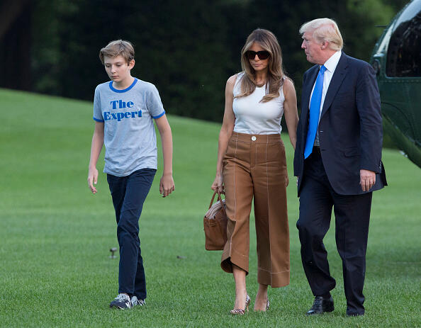 WASHINGTON, D.C. - JUNE 11: (AFP-OUT) U.S. President Donald Trump, first lady Melania Trump and their son Barron Trump arrive at the White House June 11, 2017 in Washington, DC. According to reports, Melania and Barron will soon be moving from Trump Tower in New York City to the White House. (Photo by Chris Kleponis-Pool/Getty Images)