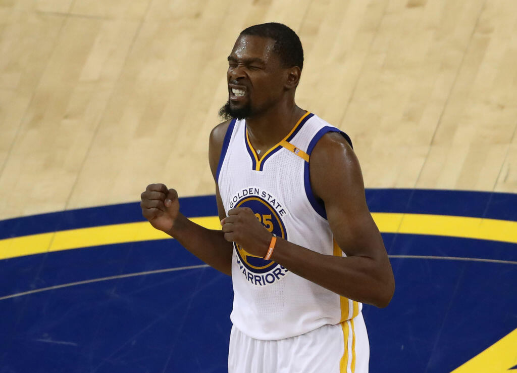 OAKLAND, CA - JUNE 12: Kevin Durant #35 of the Golden State Warriors reacts against the Cleveland Cavaliers during the second half in Game 5 of the 2017 NBA Finals at ORACLE Arena on June 12, 2017 in Oakland, California. NOTE TO USER: User expressly acknowledges and agrees that, by downloading and or using this photograph, User is consenting to the terms and conditions of the Getty Images License Agreement.  (Photo by Ezra Shaw/Getty Images)