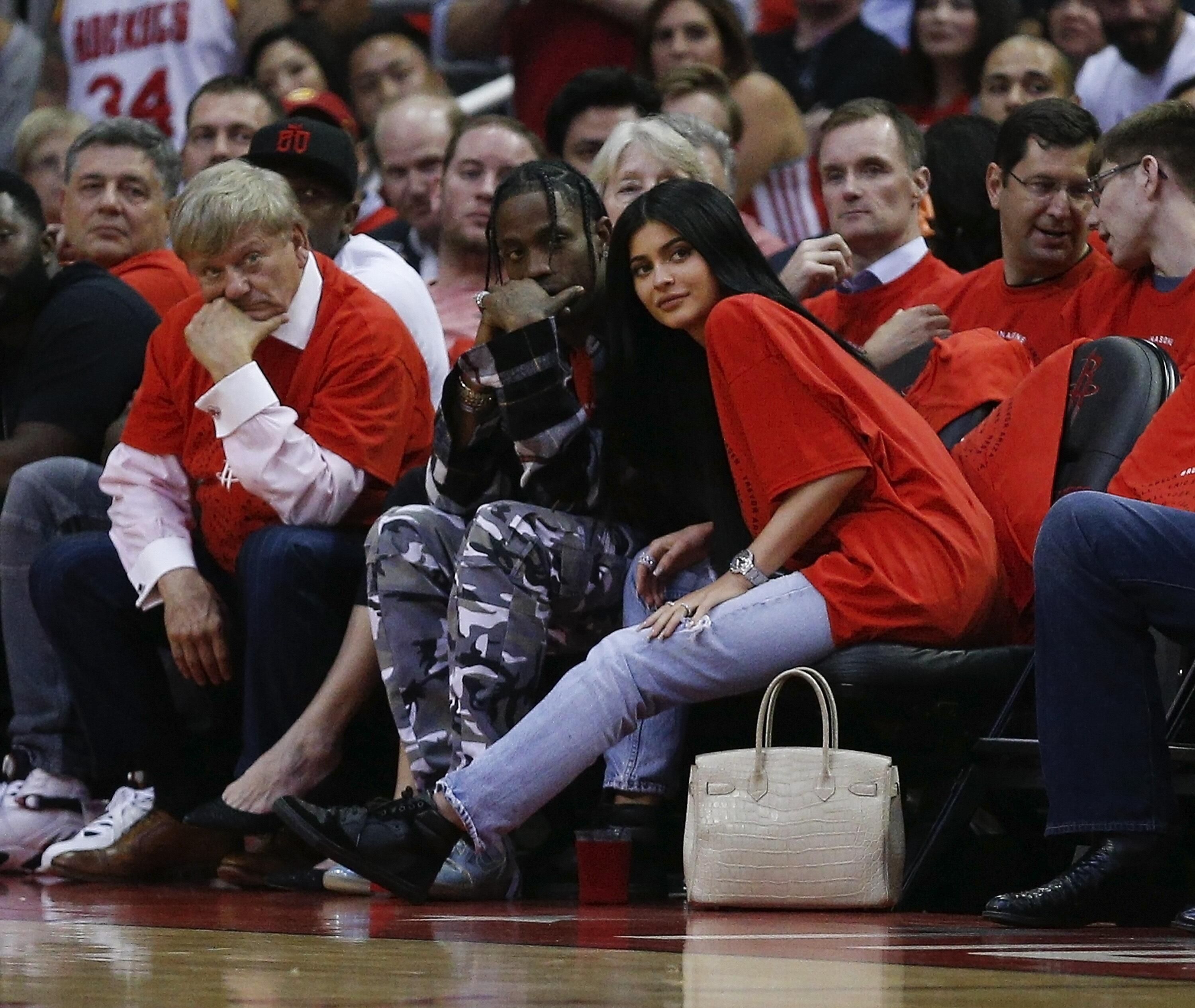 HOUSTON, TX - APRIL 25:  Houston rapper Travis Scott and Kylie Jenner watch courtside during Game Five of the Western Conference Quarterfinals game of the 2017 NBA Playoffs at Toyota Center on April 25, 2017 in Houston, Texas. NOTE TO USER: User expressly