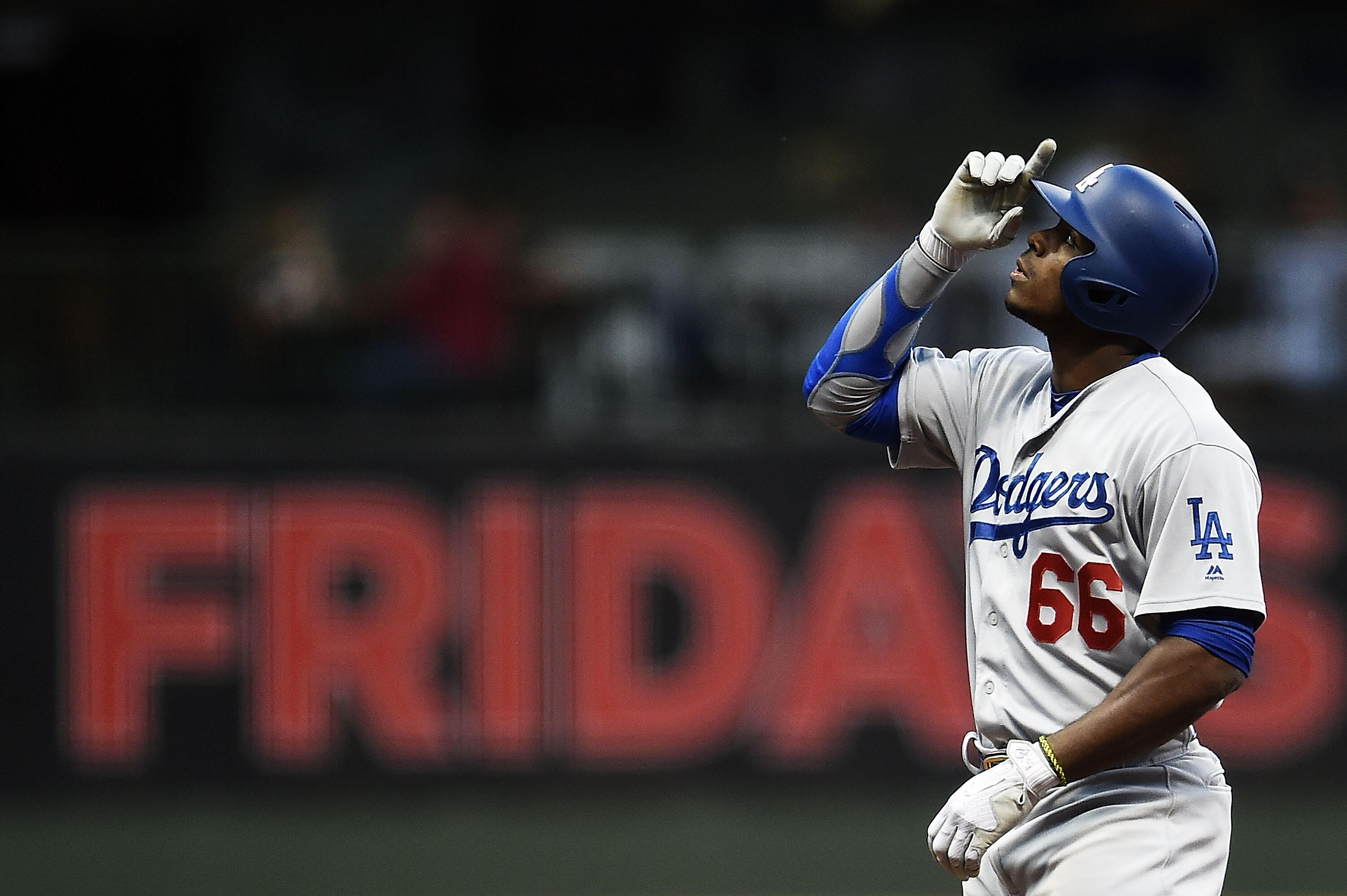 MILWAUKEE, WI - JUNE 02:  Yasiel Puig #66 of the Los Angeles Dodgers reacts to a double during the fifth inning of a game against the Milwaukee Brewers at Miller Park on June 2, 2017 in Milwaukee, Wisconsin.  (Photo by Stacy Revere/Getty Images)