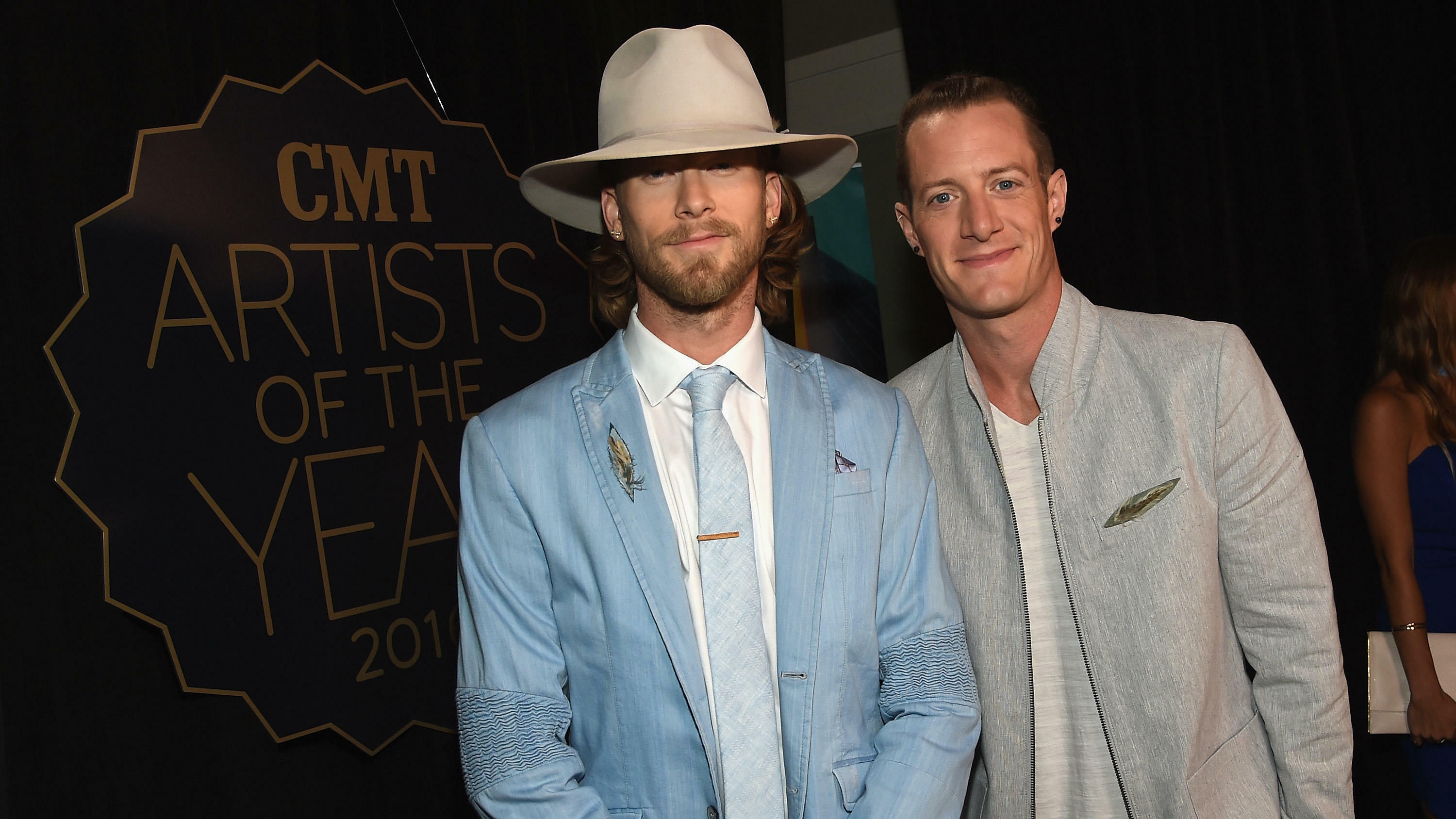 NASHVILLE, TN - OCTOBER 19:  Brian Kelley (L) and Tyler Hubbard (R) of Florida Georgia Line arrive on the red carpet at CMT Artists of the Year 2016 on October 19, 2016 in Nashville, Tennessee.  (Photo by Rick Diamond/Getty Images for CMT)