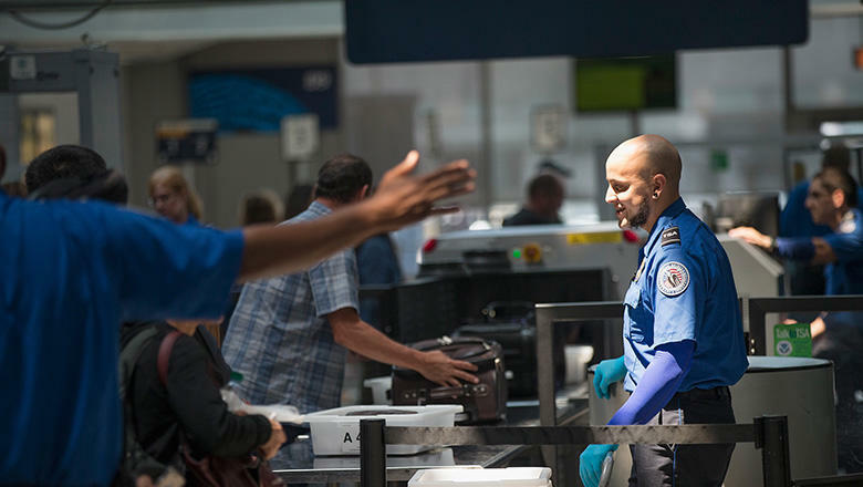 CHICAGO, IL - JUNE 02:  Travelers are screened by Transportation Security Administration (TSA) workers at a security check point at O'Hare Airport on June 2, 2015 in Chicago, Illinois. The Department of Homeland Security said that the acting head of the T