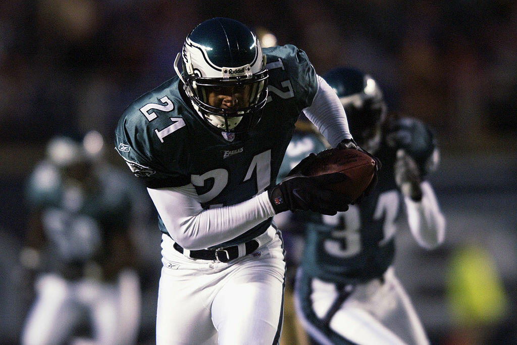 PHILADELPHIA - DECEMBER 1:  Cornerback Bobby Taylor #21 of the Philadelphia Eagles runs an interception back 23 yards for a touchdown against the St. Louis Rams in the first quarter of the NFL game on December 1, 2002 at Veterans Stadium in Philadelphia, 