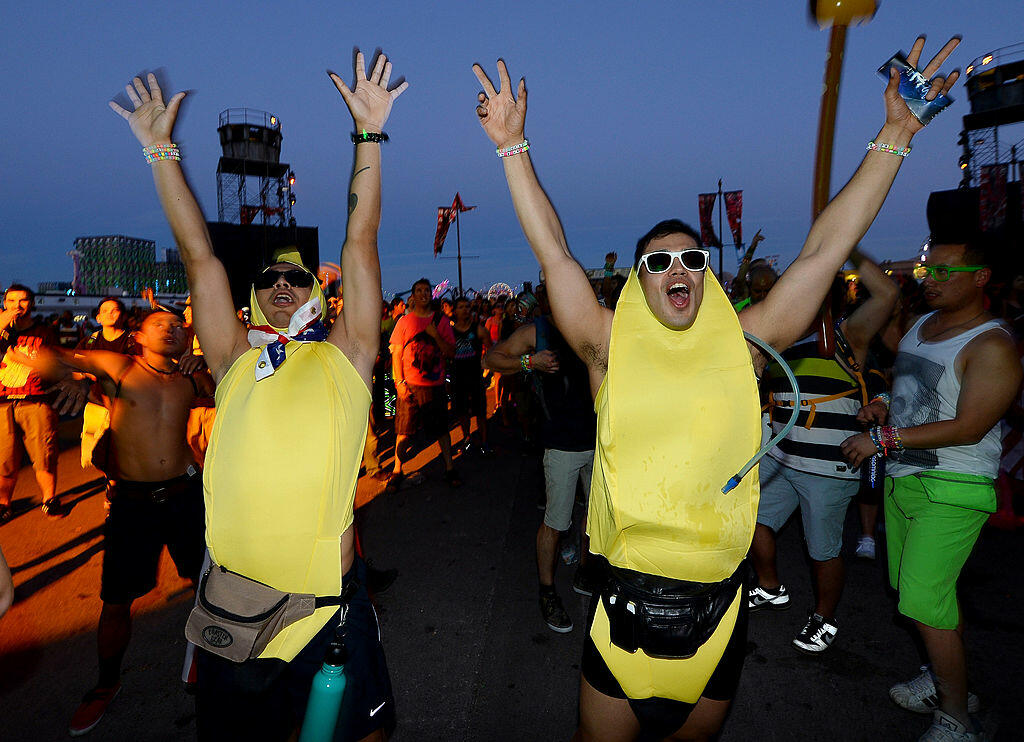 LAS VEGAS, NV - JUNE 21:  Eric Cazares (L) and Hector Torres, both from California, dance at the 17th annual Electric Daisy Carnival at Las Vegas Motor Speedway on June 21, 2013 in Las Vegas, Nevada.  (Photo by Ethan Miller/Getty Images)