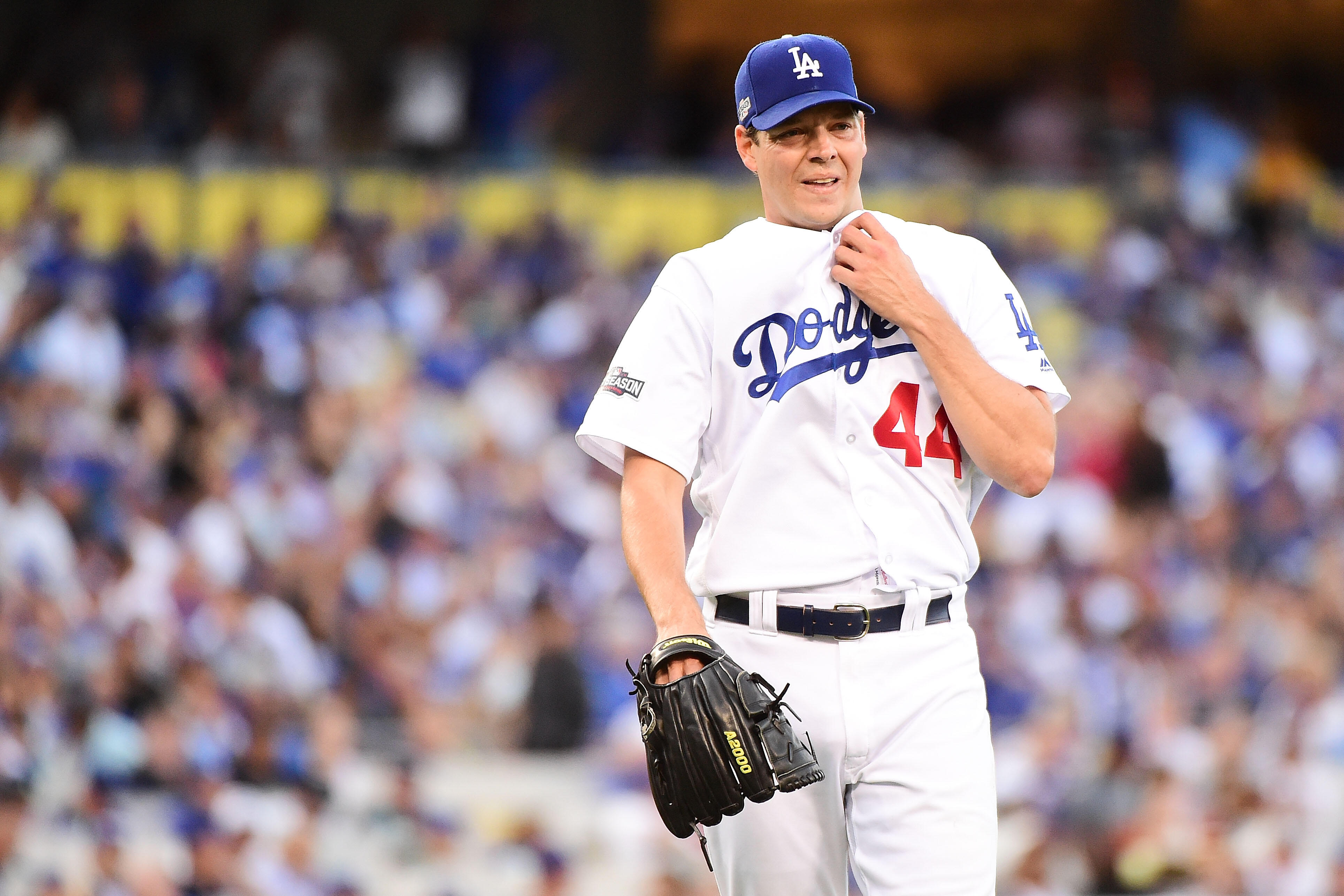 LOS ANGELES, CA - OCTOBER 18:  Rich Hill #44 of the Los Angeles Dodgers reacts against the Chicago Cubs during the second inning of game three of the National League Championship Series at Dodger Stadium on October 18, 2016 in Los Angeles, California.  (P