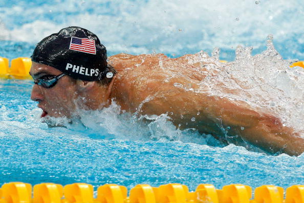 BEIJING - AUGUST 17:  Michael Phelps of the Unites States competes in the butterfly leg of the Men's 4x100 Medley Relay held at the National Aquatics Centre during Day 9 of the Beijing 2008 Olympic Games on August 17, 2008 in Beijing, China.  The United S