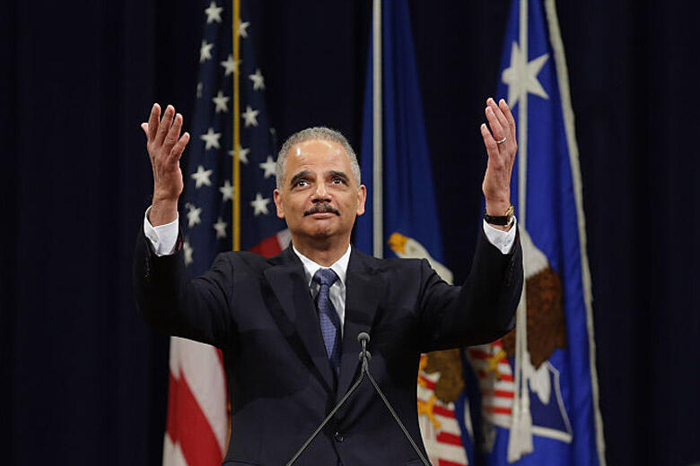 WASHINGTON, DC - APRIL 24:  U.S. Attorney General Eric Holder thanks Justice Department employees as he delivers his parting remarks at the Robert F. Kennedy building April 24, 2015 in Washington, DC. The first African American attorney general in U.S. hi