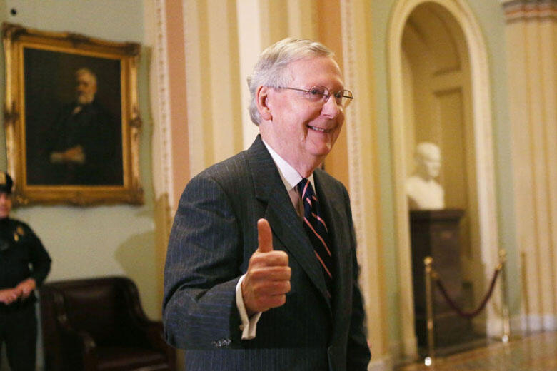 WASHINGTON, DC - FEBRUARY 07:  Senate Majority Leader Mitch McConnell (R-KY) gives the thumbs-up to the media after the Senate voted to confirm Betsy DeVos as education secretary on Capitol Hill on February 7, 2017 in Washington, D.C. The historic 51-50 v