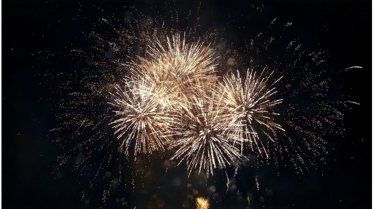 Low Angle View Of Firework Display At Night