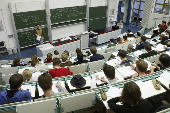 BERLIN, GERMANY - JANUARY 13:  Students attend a lecture in the computer studies department at the Freie Universitaet January 13, 2003 in Berlin, Germany. The German university system is facing cuts of EUR 75 million in state funding over the next four ye