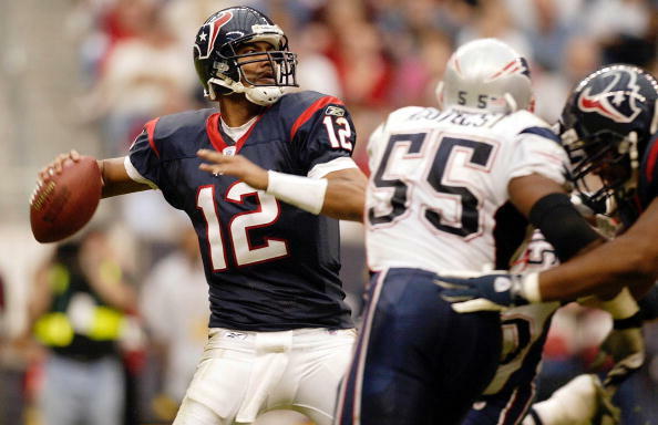 HOUSTON -  NOVEMBER 23:  Quarterback Tony Banks #12 of the Houston Texans looks to pass against the New England Patriots at Reliant Stadium on November 23, 2003 in Houston, Texas.  The Patriots defeated the Texans 23-20 in overtime.  (Photo by Ronald Mart