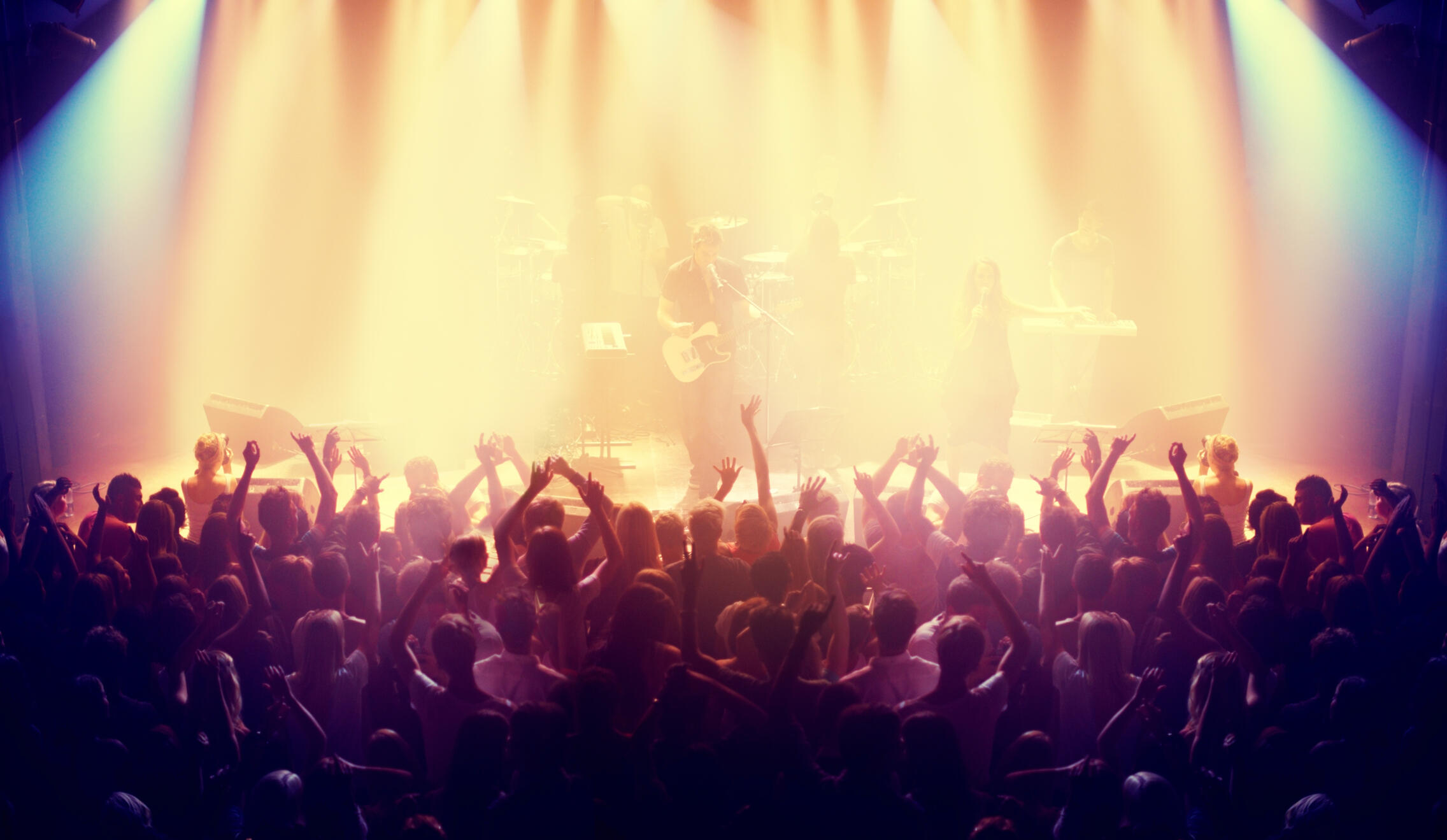 Shot of a crowd at a music concert. This concert was created for the sole purpose of this photo shoot, featuring 300 models and 3 live bands. All people in this shoot are model released.http://195.154.178.81/DATA/i_collage/pi/shoots/782538.jpg