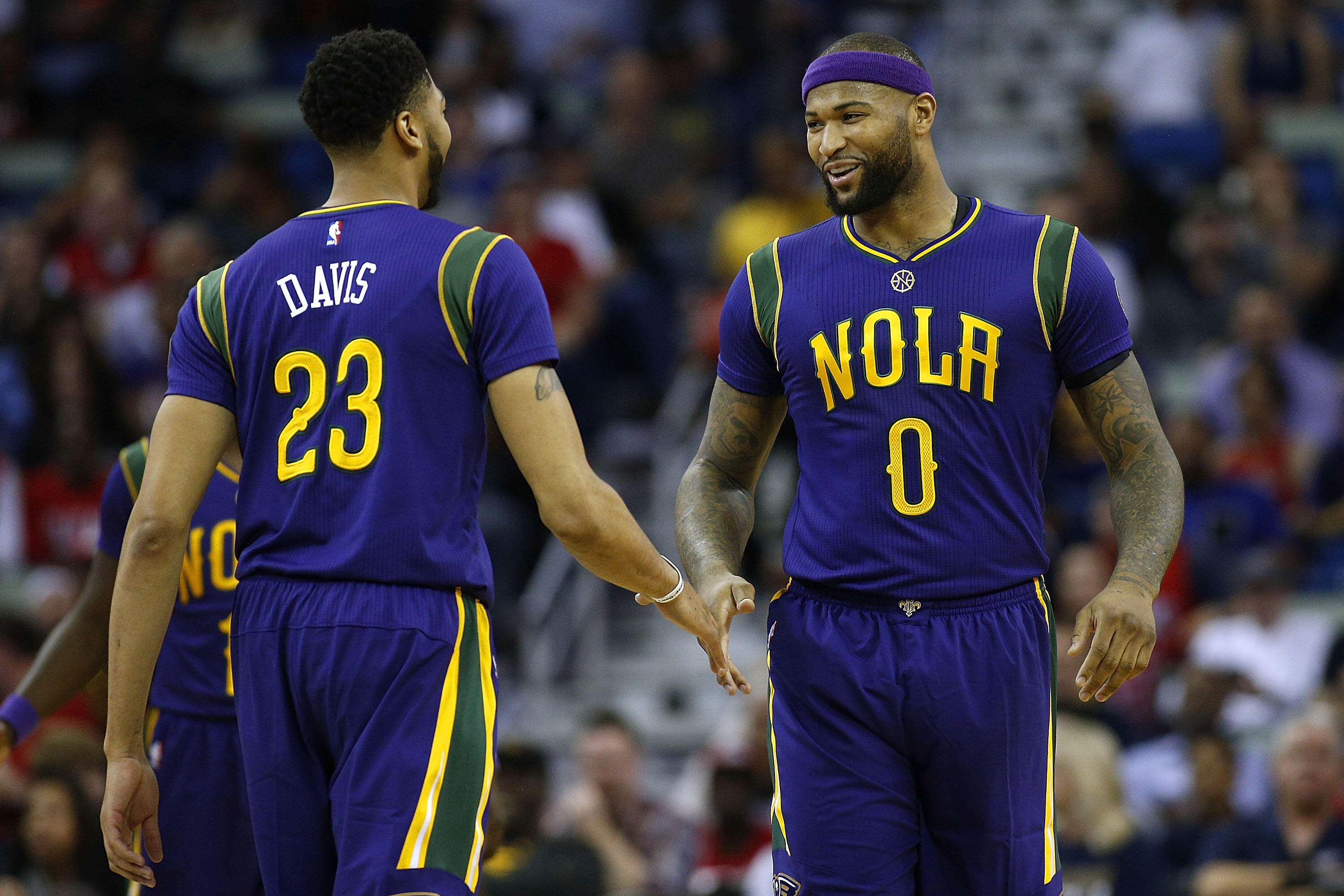 NEW ORLEANS, LA - FEBRUARY 23:  DeMarcus Cousins #0 of the New Orleans Pelicans and Anthony Davis #23 talk during a game against the Houston Rockets at the Smoothie King Center on February 23, 2017 in New Orleans, Louisiana. NOTE TO USER: User expressly a