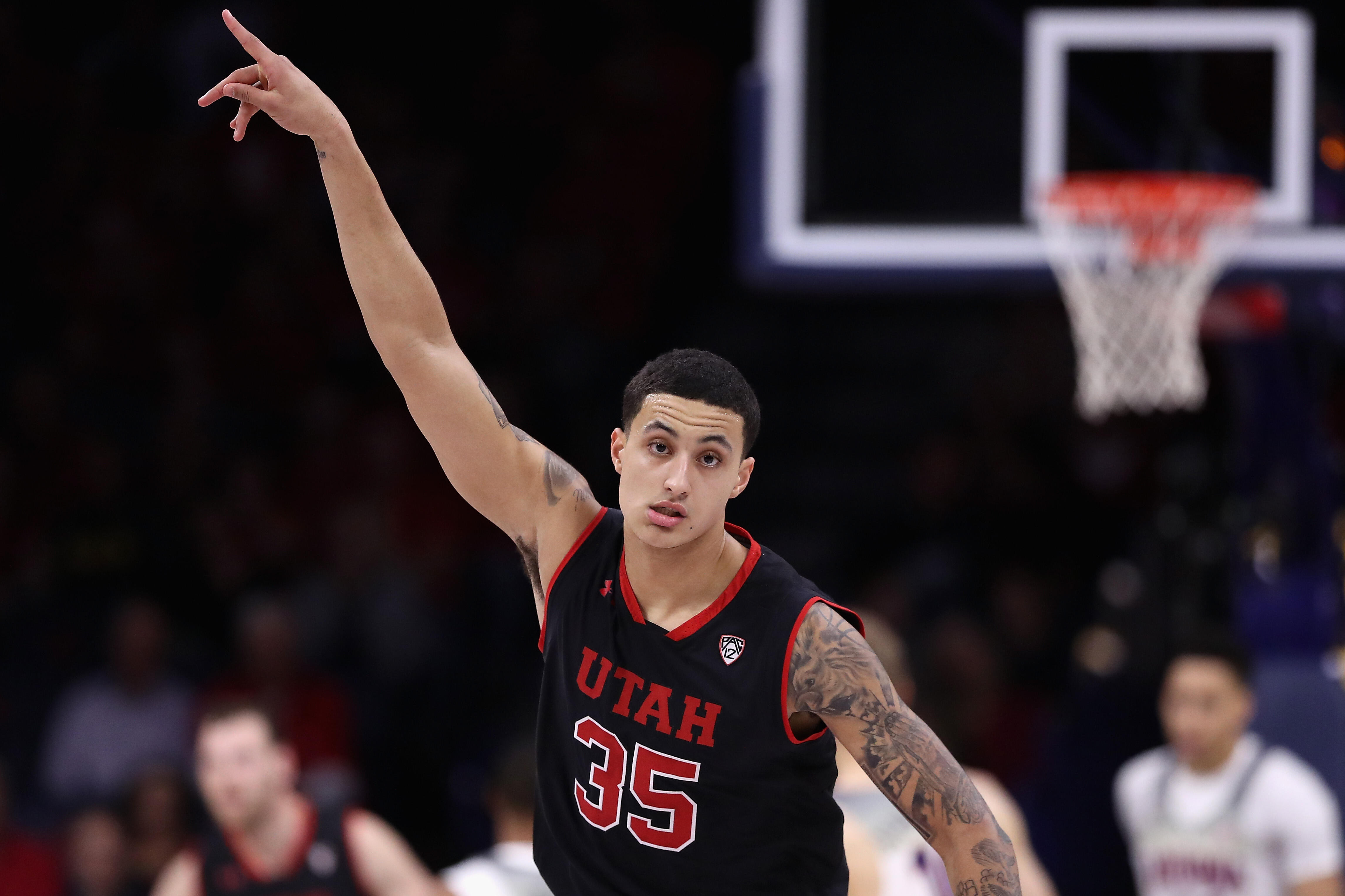 TUCSON, AZ - JANUARY 05:  Kyle Kuzma #35 of the Utah Utes reacts to a three point shot against the Arizona Wildcats during the first half of the college basketball game at McKale Center on January 5, 2017 in Tucson, Arizona.  (Photo by Christian Petersen/