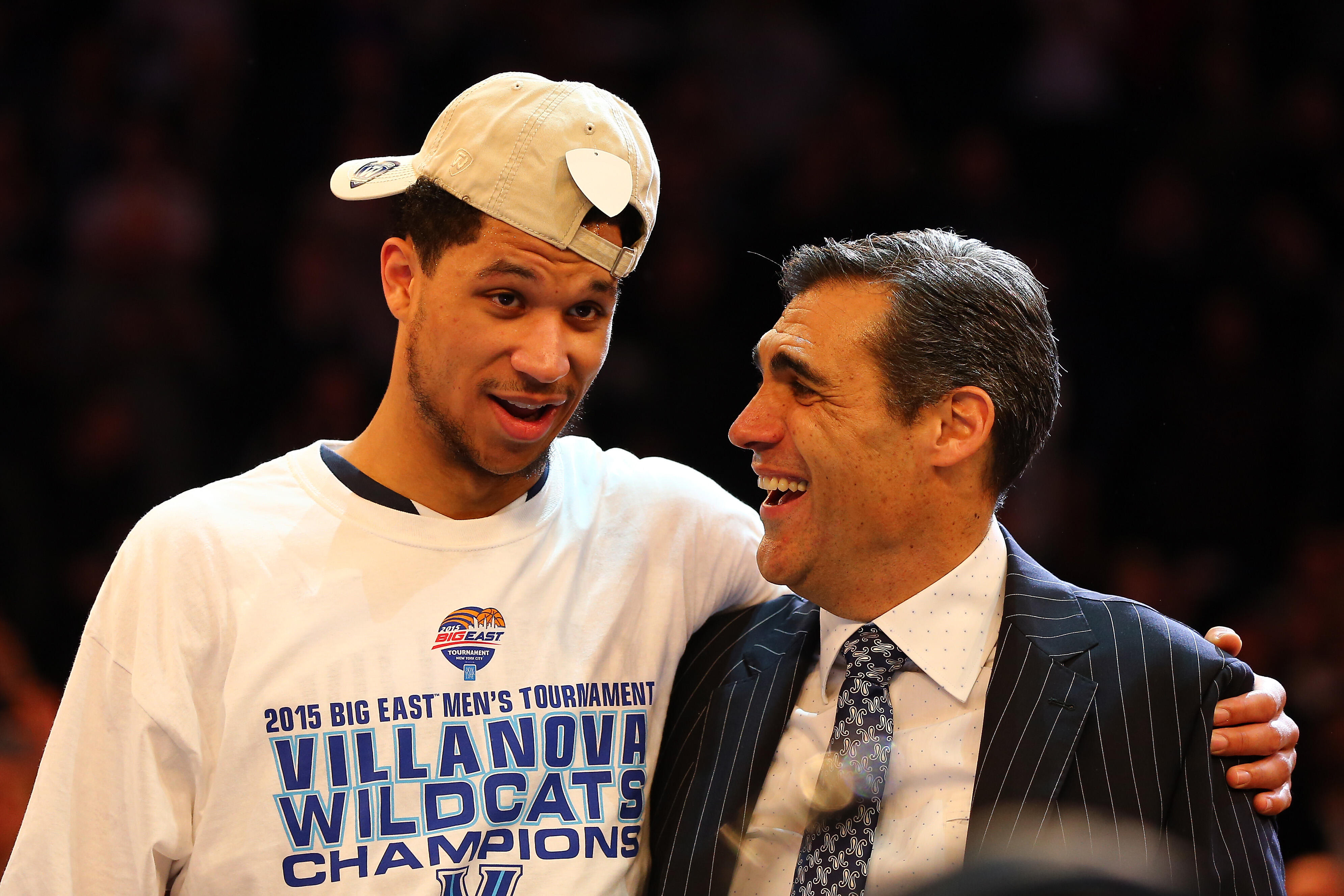 NEW YORK, NY - MARCH 14: Josh Hart #3 celebrates with head coach Jay Wright of the Villanova Wildcats after defeating the Xavier Musketeers 69-52 in the championship game of the Big East basketball tournament at Madison Square Garden on March 14, 2015 in 