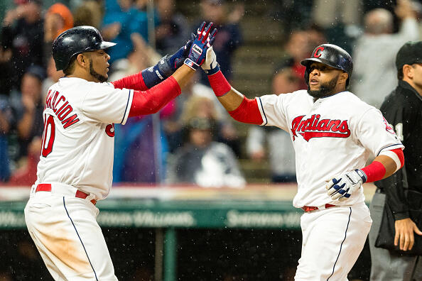 CLEVELAND, OH - JUNE 26: Edwin Encarnacion #10 celebrates with Carlos Santana #41 of the Cleveland Indians as both score on a single by Lonnie Chisenhall #8 during the sixth inning at Progressive Field on June 26, 2017 in Cleveland, Ohio. (Photo by Jason Miller/Getty Images)