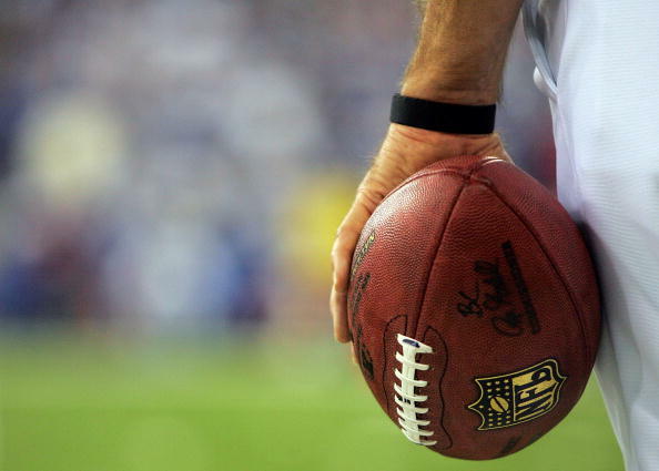INDIANAPOLIS - JANUARY 21:  A referee holds a football during the AFC Championship Game between the Indianapolis Colts and the New England Patriots on January 21, 2007 at the RCA Dome in Indianapolis, Indiana.  (Photo by Andy Lyons/Getty Images)