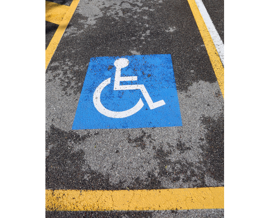 wheelchair symbol on a car reserved parking