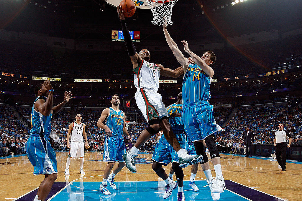 NEW ORLEANS - OCTOBER 27:  Corey Maggette #5 of the Milwaukee Bucks shoots the ball over Jason Smith #14 of the New Orleans Hornets at the New Orleans Arena on October 27, 2010 in New Orleans, Louisiana.  NOTE TO USER: User expressly acknowledges and agre