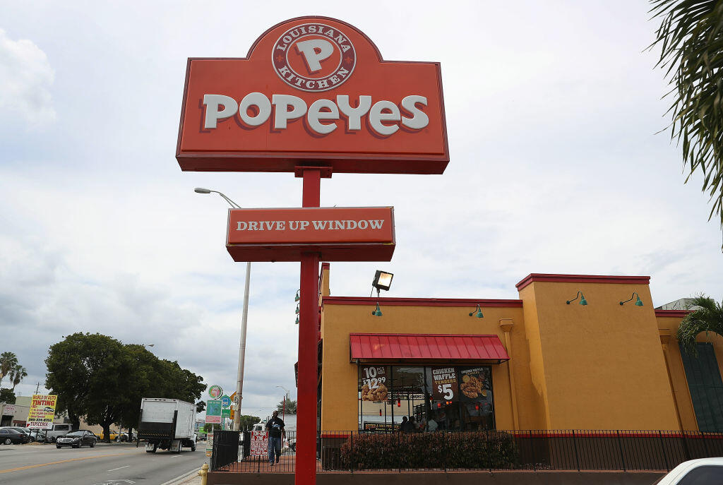 MIAMI, FL - FEBRUARY 21:  A Popeyes restaurant is seen on February 21, 2017 in Miami, Florida. Burger King and Tim Horton's owner Restaurant Brands International has announced plans on buying Popeyes Louisiana Kitchen in a deal valued at $1.8 billion.  (Photo by Joe Raedle/Getty Images)