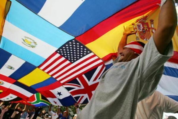 Immigration rights supporters billow a p