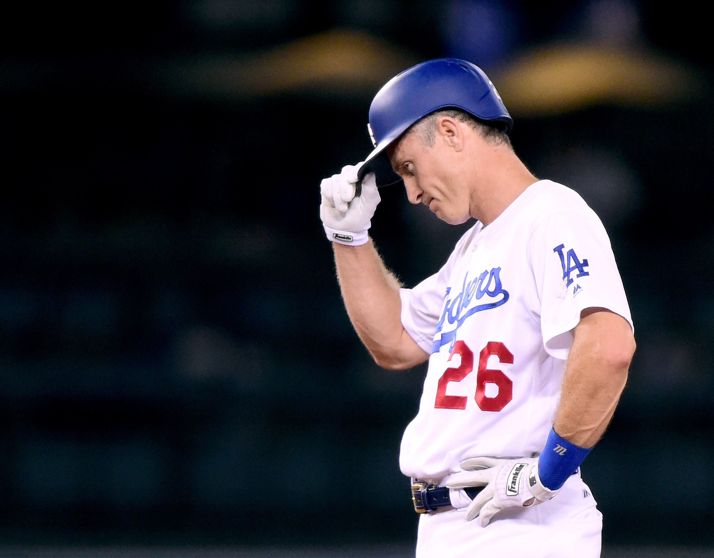 LOS ANGELES, CA - JULY 07:  Chase Utley #26 of the Los Angeles Dodgers reacts to applause from the crowd for his 1000th RBI after driving in Joc Pederson #31 with a double to take a 4-1 lead over the Kansas City Royals during the eighth inning at Dodger S