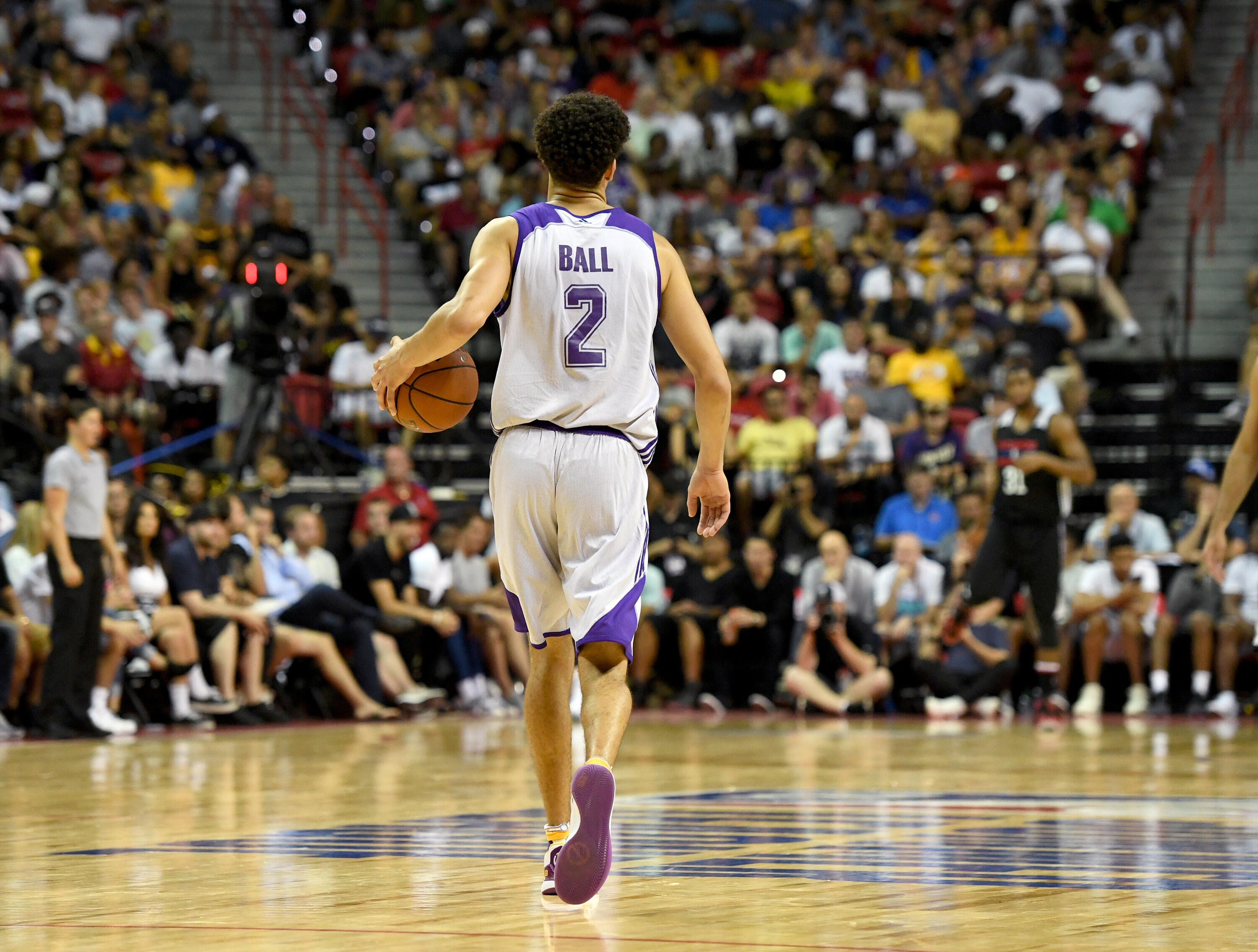 LAS VEGAS, NV - JULY 07:  Lonzo Ball #2 of the Los Angeles Lakers brings the ball up the court against the Los Angeles Clippers during the 2017 Summer League at the Thomas & Mack Center on July 7, 2017 in Las Vegas, Nevada. The Clippers won 96-93 in overt