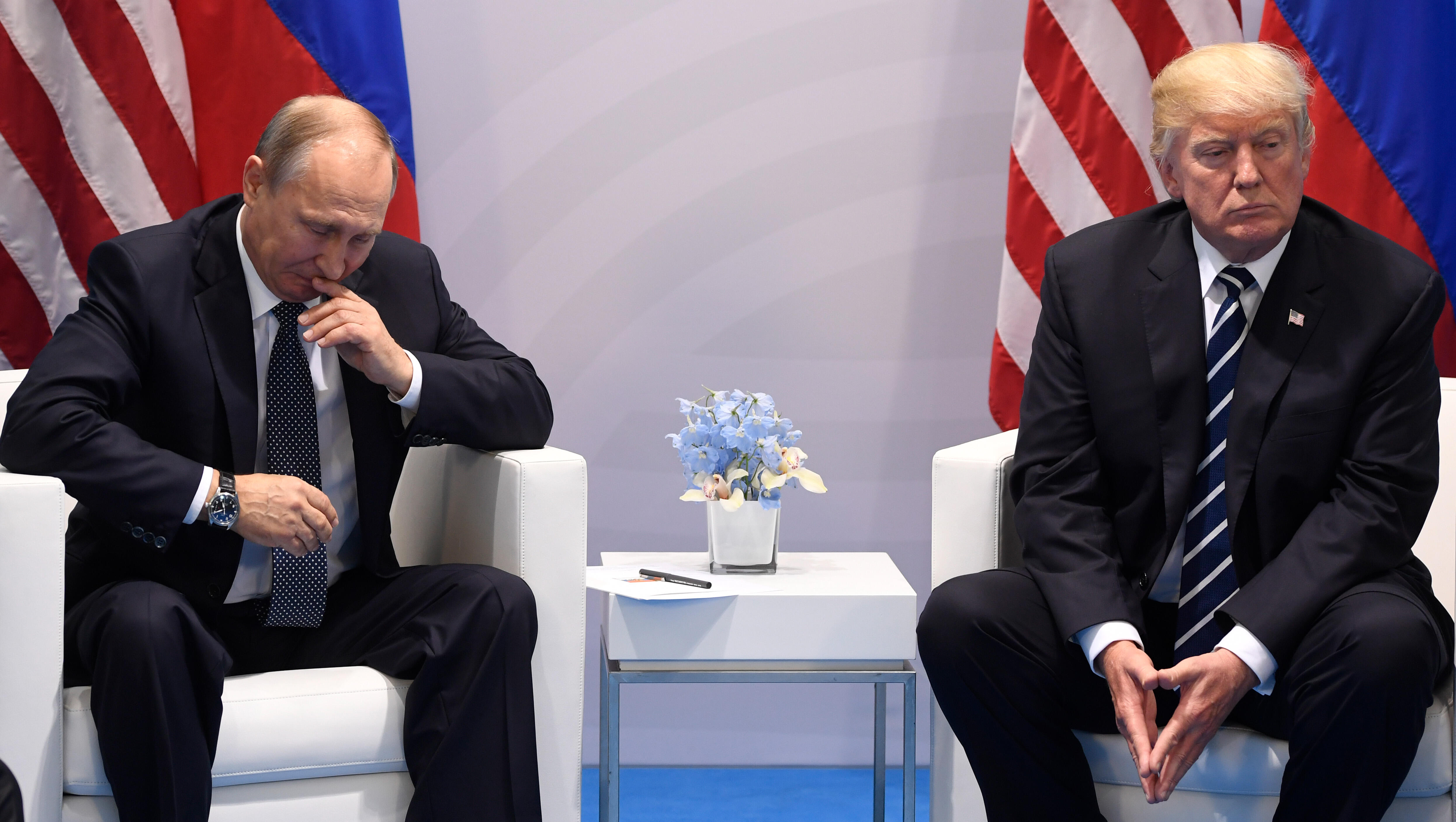 US President Donald Trump and Russia's President Vladimir Putin shake hands during a meeting on the sidelines of the G20 Summit in Hamburg, Germany, on July 7, 2017. / AFP PHOTO / SAUL LOEB        (Photo credit should read SAUL LOEB/AFP/Getty Images)