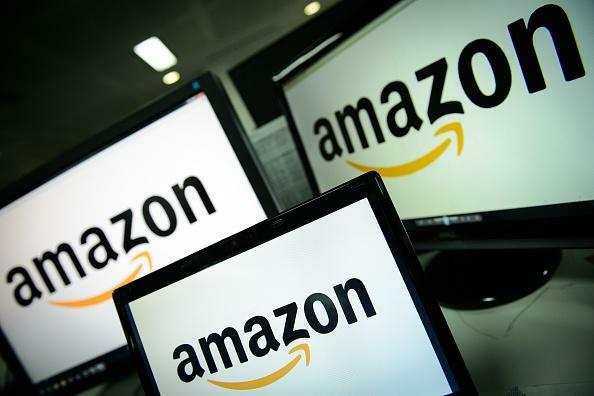 A picture shows the logo of the online retailer Amazon dispalyed on computer screens in London on December 11, 2014. Online retail giant Amazon scored its first ever Golden Globe nominations  -- a breakthrough in its bid to catch up with streaming pioneer Netflix. AFP PHOTO / LEON NEAL        (Photo credit should read LEON NEAL/AFP/Getty Images)