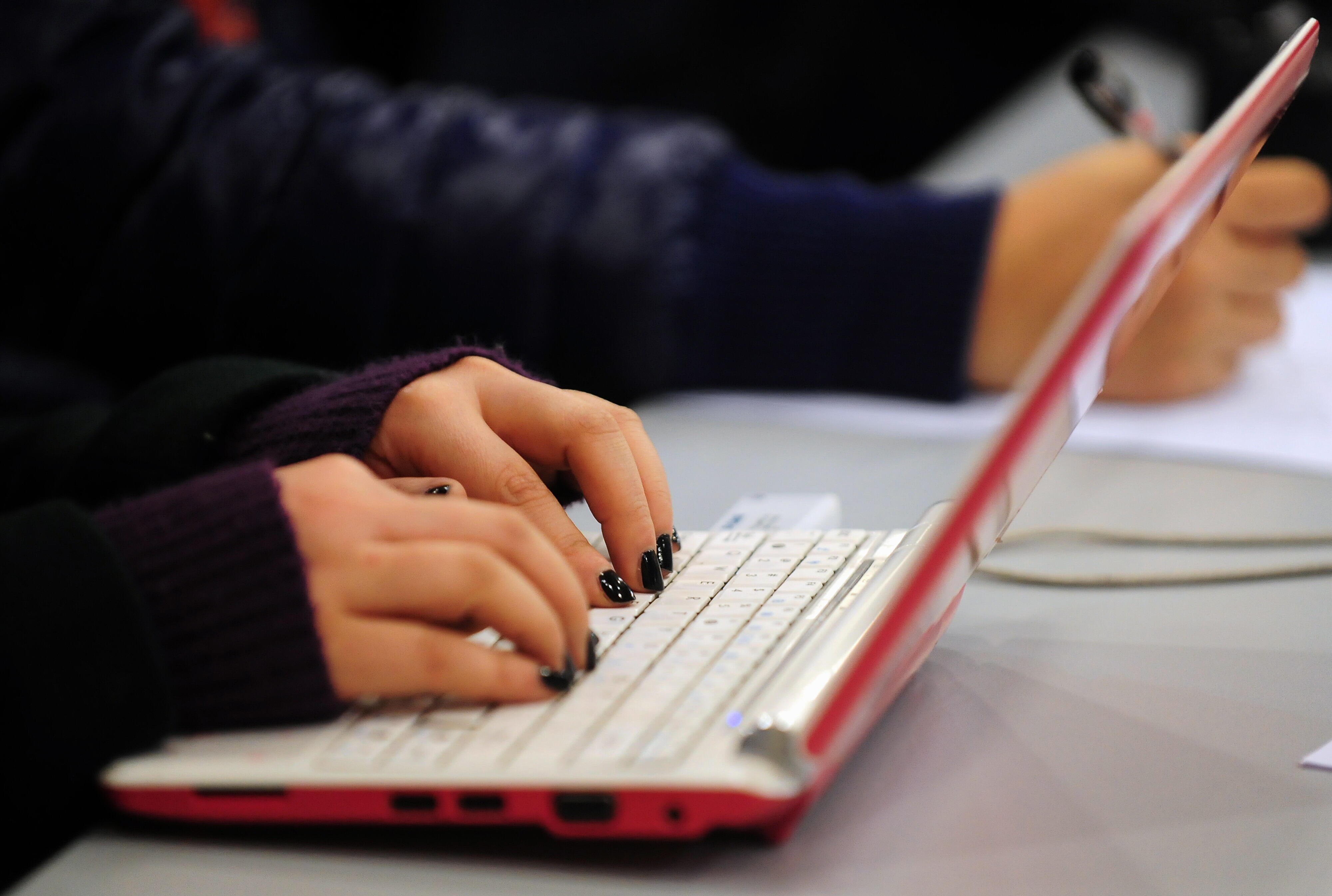 This photo taken on January 7, 2010 shows a woman typing on the keyboard of her laptop computer in Beijing. China declared its Internet 