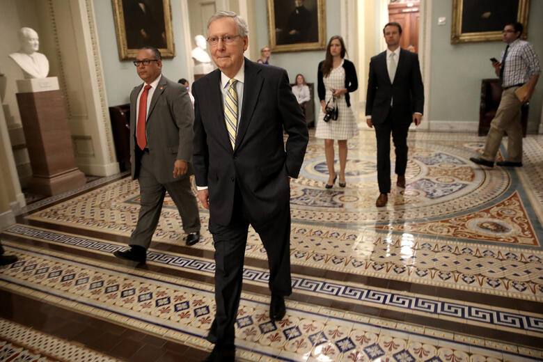 WASHINGTON, DC - JULY 13:  Senate Majority Leader Mitch McConnell (R-KY) walks to a meeting of Republican senators where a new version of their healthcare bill was scheduled to be released at the U.S. Capitol July 13, 2017 in Washington, DC. The latest ve