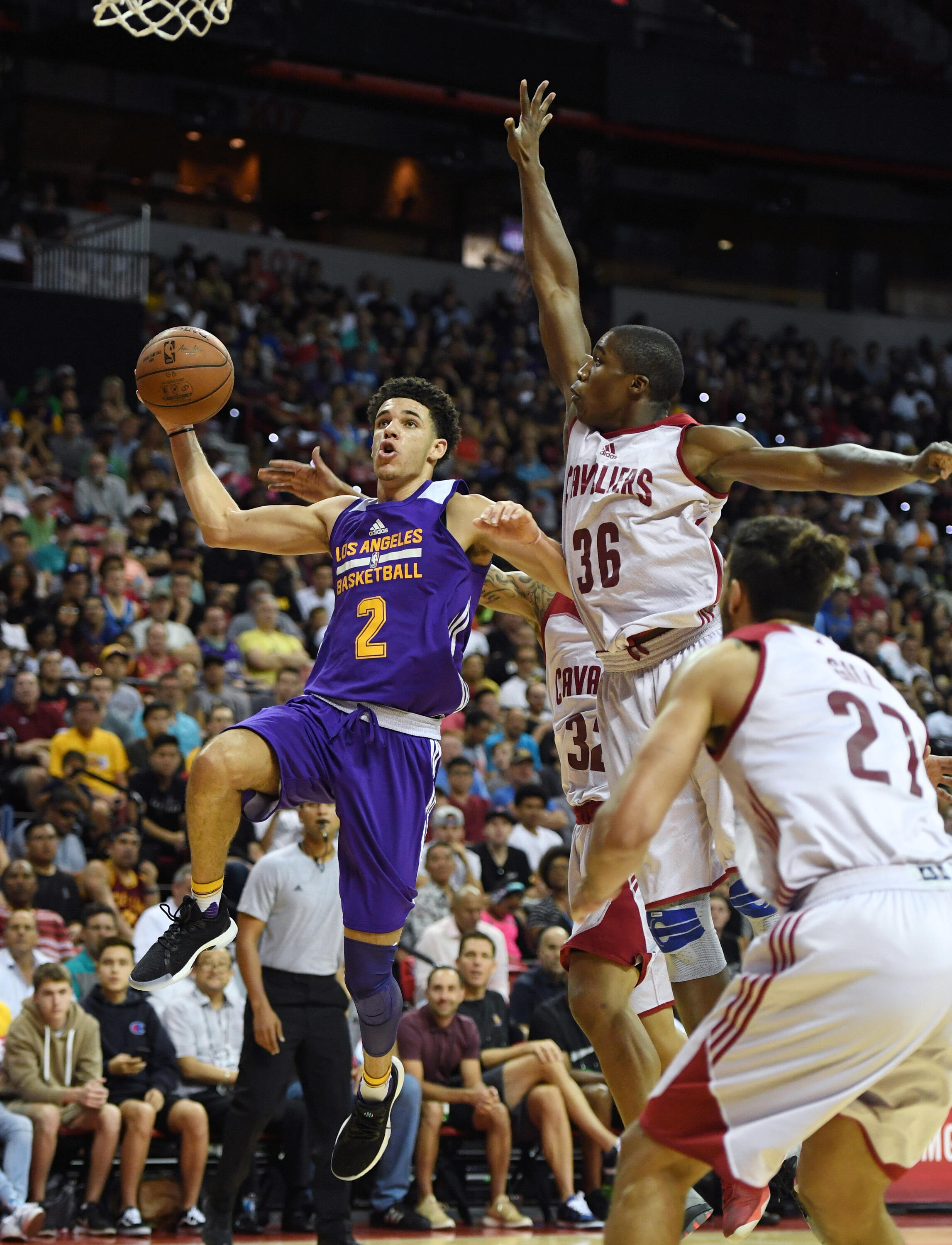 LAS VEGAS, NV - JULY 13:  Lonzo Ball #2 of the Los Angeles Lakers drives to the basket against Gerald Beverly #36 of the Cleveland Cavaliers during the 2017 Summer League at the Thomas & Mack Center on July 13, 2017 in Las Vegas, Nevada. NOTE TO USER: Use