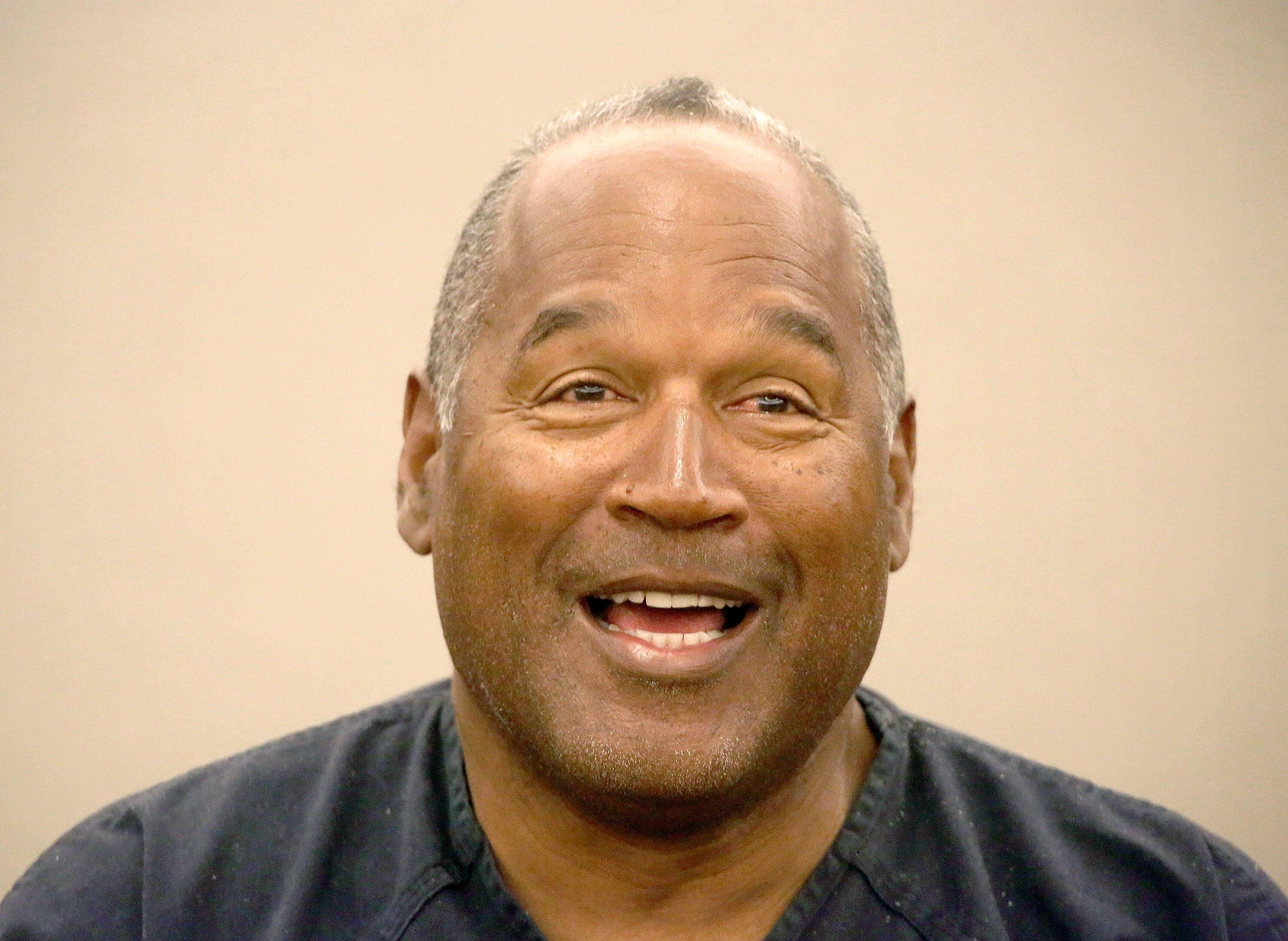 LAS VEGAS, NV - MAY 15:  O.J. Simpson testifies during an evidentiary hearing in Clark County District Court May 15, 2013 in Las Vegas, Nevada. Simpson, who is currently serving a nine to 33-year sentence in state prison as a result of his October 2008 co