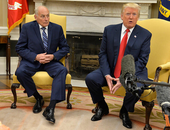 WASHINGTON, D.C. - JULY 31: (AFP-OUT) President Donald Trump (R) speaks to the press after the new White House Chief of Staff John Kelly (L) was sworn in, in the Oval Office of the White House, July 31, 2017, in Washington, DC. Kelly, a retired Marine Corps general and former secretary of the Department of Homeland Security, replaces Reince Priebus. (Photo by Mike Theiler-Pool/Getty Images)