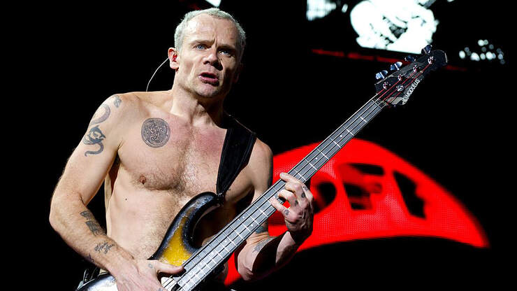 Flea Calls Cutting School Music Programs 