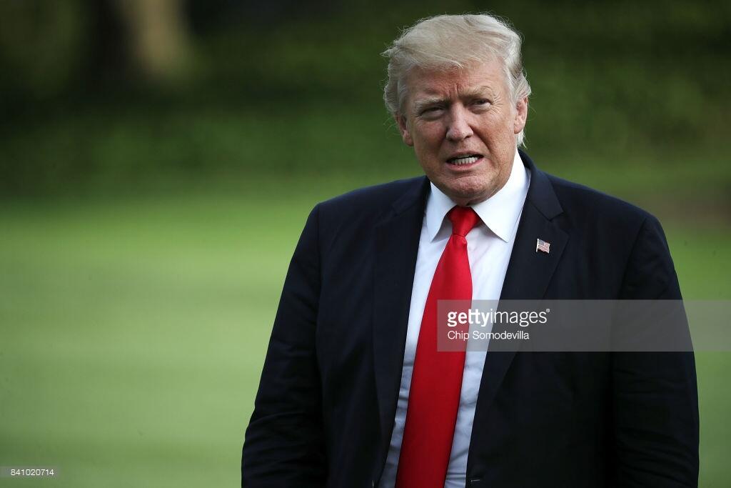 WASHINGTON, DC - AUGUST 30: U.S. President Donald Trump walks across the South Lawn after returning to the White House August 30, 2017, in Washington, DC. Trump traveled to Springfield, Missouri, to participate in a tax reform kickoff event, according to the White House. (Photo by Chip Somodevilla/Getty Images)