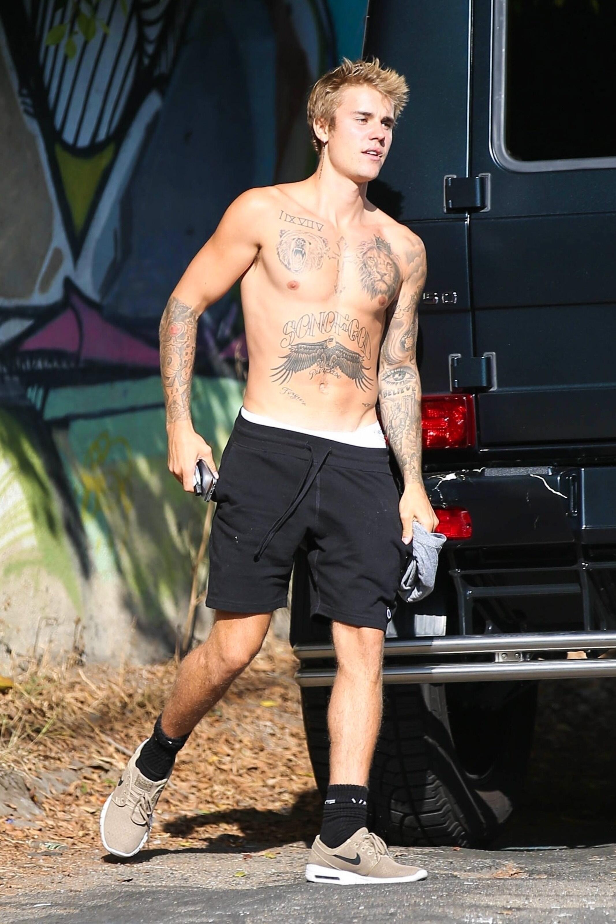 11 Shirtless Photos of Justin Bieber to Quench Your Thirst | iHeartRadio