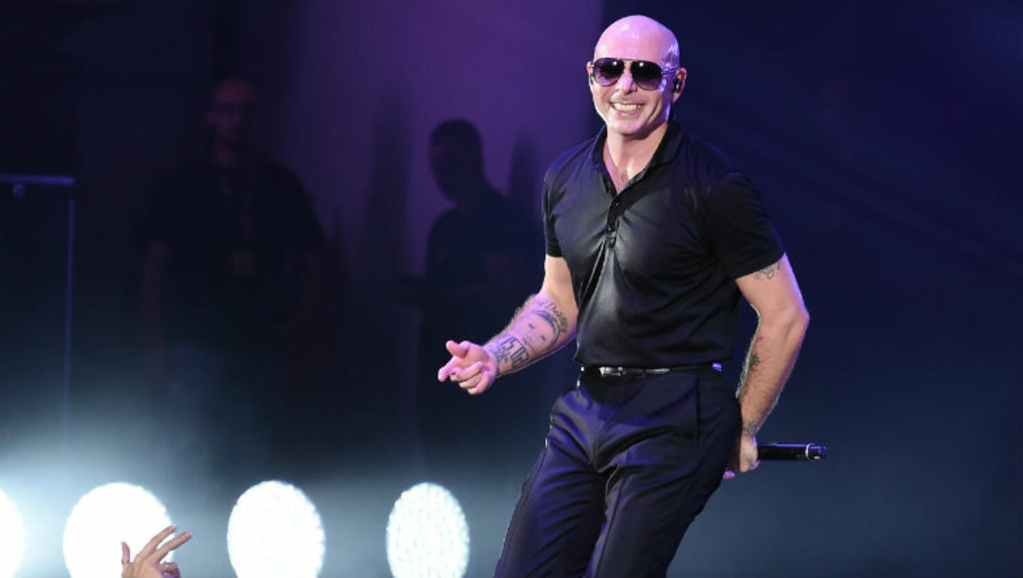 Pitbull Sends His Private Plane To Puerto Rico For Cancer Patients | iHeart