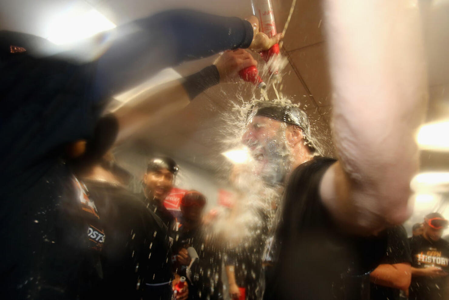 Mike Fiers #54 of the Houston Astros celebrates with teammates
